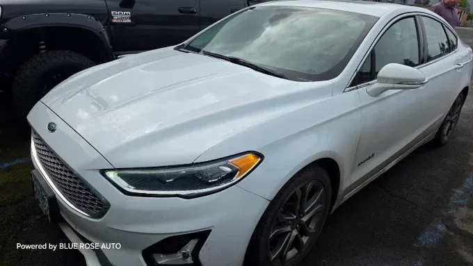 Ford Fusion Hybrid white exterior after full auto detail — Blue Rose Auto Detailing Springfield OR